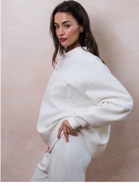 Parke Bridal Varsity
Mockneck in Pearl Size L/XL
NEW IN BAG